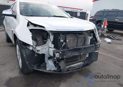 2015 Cadillac Srx Luxury Collection z USA, uszkodzony, nr VIN 3GYFNBE37FS538331